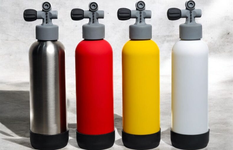 Four Deep stainless steel water bottles in red, silver, yellow, and white, designed for scuba divers and ocean lovers.
